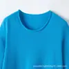 Suéter de lana de cachemira para mujer para otoño e invierno, nuevo cuello redondo de bloques de color versátil de dos piezas falsas top básico suéter de cachemira