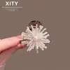 Pinza para el pelo con diseño de flor de cuentas de mijo de temperamento de alta gama para mujer, moderna, estilo coreano, para la nuca, media coleta, nuevo pinza lateral