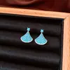 Pendientes de borla con flor de trébol de circonita vintage con un toque de alta gama, pendientes versátiles y de moda al por mayor