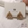 Pendientes de plata 925 chapados en oro y cobre con hebilla de oreja hueca de estilo exagerado con personalidad de Europa y Estados Unidos al por mayor transfronterizos para mujer