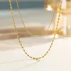 Moda europeia e americana ins design simples de nicho corrente de arroz personalidade aço inoxidável banhado a ouro 18K colar multicamadas feminino atacado