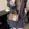 Bolso de Mano Cuadrado Pequeño de Nicho Estilo Coreano para Mujer, Nuevo Modelo Primavera 2026, Alta Calidad, Elegante, Versátil Bolso de Hombro y Cruzado