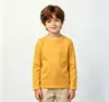 Camiseta Base de Manga Larga con Cuello Redondo de Color Sólido para Niños Camiseta Básica Elástica de Algodón para Niños Top de Ropa Interior para Primavera y Otoño Ropa Infantil Transfronteriza