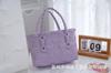 En stock al por mayor de fábrica pequeño color fresco Cuadrado tejido de PE para niñas bolso de mano estilo moderno simple cesta de verduras