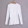 Camiseta Feminina de Manga Longa com Gola Redonda, Malha, Fenda Lateral Irregular, Cor Sólida, Skinny, Peça Versátil para o Outono