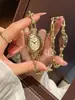 Nuevo producto más vendido: Pulsera con forma de bañera para mujer, reloj de pulsera de cuarzo para mujer, ovalado de moda con números romanos