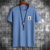 Camiseta de Manga Corta para Hombre Primavera y Verano 2026 Nueva Tendencia Manga Media Algodón Cuello Redondo Chaqueta de Estudiante Talla Grande Camiseta Básica