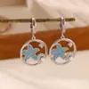 Pendientes de Acero Inoxidable Chapado en Oro de 18K Flor Estrella de Mar para Mujer Pendientes de Temperamento Estilo Oceánico Joyería Transfronteriza Venta al por Mayor