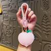 Llavero creativo de cuero con forma de fruta y diseño de celebridad de Internet, ideal como mochila escolar para estudiantes, regalo pequeño y exquisito para parejas.