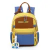 Mochila Infantil Transfronteriza de Nuevo Estilo con Parches de Colores, Versión Coreana de Moda, Ligera para Guardería, Mochila Protectora de la Columna Vertebral