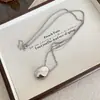 Colar com Pingente de Gota d'Água em Aço Titânio Prateado para Mulheres 2025 Novo Estilo Quente Luxo Acessível Acessórios de Nicho de Alta Qualidade Decoração Longa
