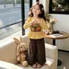 Conjunto de Primavera y Otoño para Niñas 2026 Nuevo Conjunto de Dos Piezas con Top de Dibujos Animados Elegante y Pantalones Anchos para Niña Tendencia