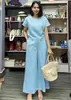 2023 Sudeste Asiático, Europa y Estados Unidos Conjunto de Traje Cruzado de Color Puro de Manga Corta Elegante de Dos Piezas para Viajes de Negocios para Mujeres Venta al por Mayor Estilo Sencillo