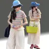 Camisetas de rayas para niñas de verano al por mayor transfronterizo 2026 nueva ropa infantil tops delgados elegantes de manga corta para niños mayores