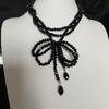 Nuevo y moderno collar con colgante de lazo de cuentas de cristal negro para mujer, cadena de clavícula con diseño apilado multicapa y moderno.