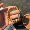 Pulseira de Dzi de Nove Olhos em Sândalo Natural de Círculo Único para Homens e Mulheres, Pulseira de Rosário com Contas de Madeira de Sândalo para o Ano de Nascimento