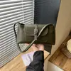Bolsa baguette de nicho super popular para outono e inverno, novo estilo 2026 para mulheres, bolsa de ombro única/sob o braço da moda para o trabalho, bolsa de mão para atividades ao ar livre