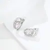 Pendientes Xuping de estilo ruso con forma de lágrima, transfronterizos europeos y americanos, hechos de aleación de cobre con baño blanco, que exudan un encanto de lujo ligero y elegante, con un diseño de doble anillo