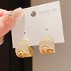 Brincos de Coração e Cruz com Agulha de Prata Galvanizada a Ouro 14K Real Estilo Luxo Acessível Europeu e Americano Brincos da Moda de Nicho de Alta Qualidade para Mulheres