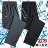Pantalones casuales de verano de fabricantes directos para hombre estilo coreano talla grande holgados puntera abierta finos deportivos de seda de hielo elásticos rectos