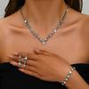 Conjunto de joyas de Europa, América y Oriente Medio para bodas, popular collar, pendientes, pulsera de diamantes blancos y negros claros para mujer, conjunto de tres piezas