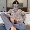 Pijama de Hombre Nuevo de Primavera y Otoño Transfronterizo de Manga Larga Cuello Redondo Holgado Estilo Coreano Talla Grande Ropa Deportiva Portátil para el Hogar Conjunto