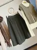 Falda de pana estilo coreano para mujer, otoño retro, color liso, cintura elástica, versátil, que cubre la cadera, adelgazante, falda de línea A