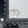 Venda Direta da Fábrica Pulseira com Pingente de Laço de Liga DIY Charme Acessório Pequeno para Roupas Femininas Puxador Prateado