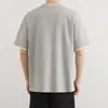Camiseta Falsa de Dos Piezas de Manga Corta 2026 Verano Nuevo Estilo para Hombre de Gama Alta Doble Capa Cuello Redondo Holgada Casual Top de Media Manga