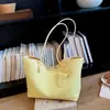 Bolso tote tejido único para mujer, nuevo modelo 2026, bolso de mano de gran capacidad, elegante y simple, adecuado para ir al trabajo, bolso de hombro para llevar debajo del brazo