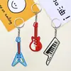 Serie de Guitarra Más Vendida Transfronteriza Llavero Colgante para Mochila Llavero Accesorios DIY Llavero de Goma Blanda de PVC Decoración
