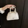 Bolsos de nicho para mujer 2026 nuevo bolso de mano de verano de alta gama de moda, versátil para uso diario, adecuado para ir al trabajo, bolso de hombro y cruzado