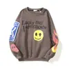 En Stock Otoño e Invierno Estilo Nuevo Kanye Cara Sonriente Letra Estampado de Espuma Sudadera con Capucha Estilo Pareja Cuello Redondo Chaqueta