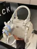 Bolsa Transfronteiriça 2026 Novo Design de Nicho Padrão Lichia Estilosa Versátil Simples para o Dia a Dia Transversal Feminina