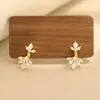 Nuevos Pendientes Pequeños Exquisitos con Incrustaciones de Diamantes de Espiga de Trigo Europeos y Americanos Elegantes Chapados en Oro de Dos Tonos Clip para Oreja Perforada Pendientes para Mujer