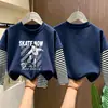 Camiseta de Manga Larga de Algodón Puro para Niños Otoño 2026 Holgada Versátil Cuello Redondo para Niños con Diseño Falso de Dos Piezas