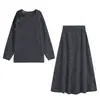 Venta al por mayor de ropa para mujer estilo europeo y americano transfronteriza, conjunto de punto de top largo de manga larga floral moderno y elegante y falda de punto tipo umbrella de cintura alta