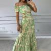 Verano 2023, ropa de mujer europea y americana, nueva moda, temperamento estampado, hombros descubiertos, cintura alta, vestido con volantes huecos para mujer