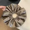 Goma de Pelo Satinada de Lunares Estilo Coreano para Mujer 2025 Nuevo Accesorio de Pelo de Alta Gama Simple Elegante Versátil para el Viaje