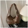 Bolsa Retrô de Rebites Transfronteiriça Feminina Grande Capacidade 2025 Nova Outono e Inverno Casual Ombro Axila Bolsa Textura Bolsa Dumpling