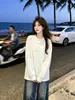 Camiseta de manga larga con botones, estilo coreano, moderna, de nicho, personalidad simple, para ir al trabajo, para mujer, nuevo estilo casual de otoño 2026