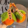 Llavero Colgante de Pompón de Felpa Piel de Conejo Sintética Colgante de Cosas Buenas Suceden Colgante de Bolso de Libro Colgante de Caqui para Mujer
