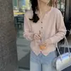 Blusa de tricô com decote V e mangas compridas com botões coloridos para mulheres, adequada para usar em camadas no outono e inverno, com design estilo coreano e feita de cashmere