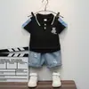 Guapo Chico Verano nueva ropa infantil de manga corta conjunto de camiseta de manga corta de mezclilla con solapa estilo Western para niños Venta al por mayor