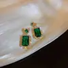 Collar con Cruz y Piedras Anillo Pendientes Set de Tres Piezas para Mujer Nicho Diseño de Alta Gama Sentido Joyería Conjunto Venta al por Mayor Moderno
