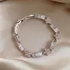 Pulsera de Cierre Exquisito de Flor de Zircón Transfronteriza Europea y Americana, Pulsera de Lujo Ligero de Gama Alta, Joyería de Mano Dulce y de Moda de Nicho para Mujeres