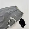Pantalones de chándal de estilo americano con cintura elástica y campana para mujer en otoño, diseño con cordón, adelgazantes, versátiles, casuales, fuente de venta al por mayor
