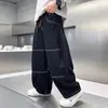 Pantalones para Niños de Comercio Exterior 2025 Nuevo Estilo para Niños Mayores, Jeans con Costuras Expuestas para Primavera y Otoño, Pantalones Rectos Modernos y a la Moda