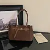 Bolso tote de hombro cruzado europeo y americano 2026 gamuza retro gran capacidad mate para mujer