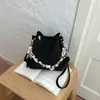 Bolsa Ruien Niche Vintage 2026 Outono Nova Bolsa Feminina Popular Bolsa Transversal Elegante Bolsa de Balde Trançada